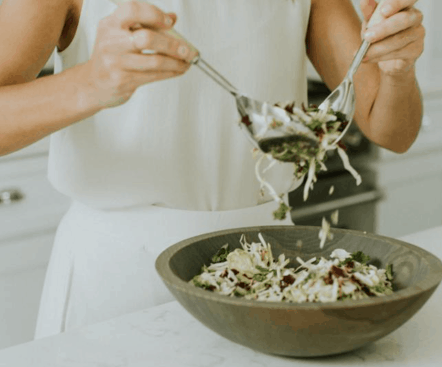 woman-making-vegetable-salad-recipe
