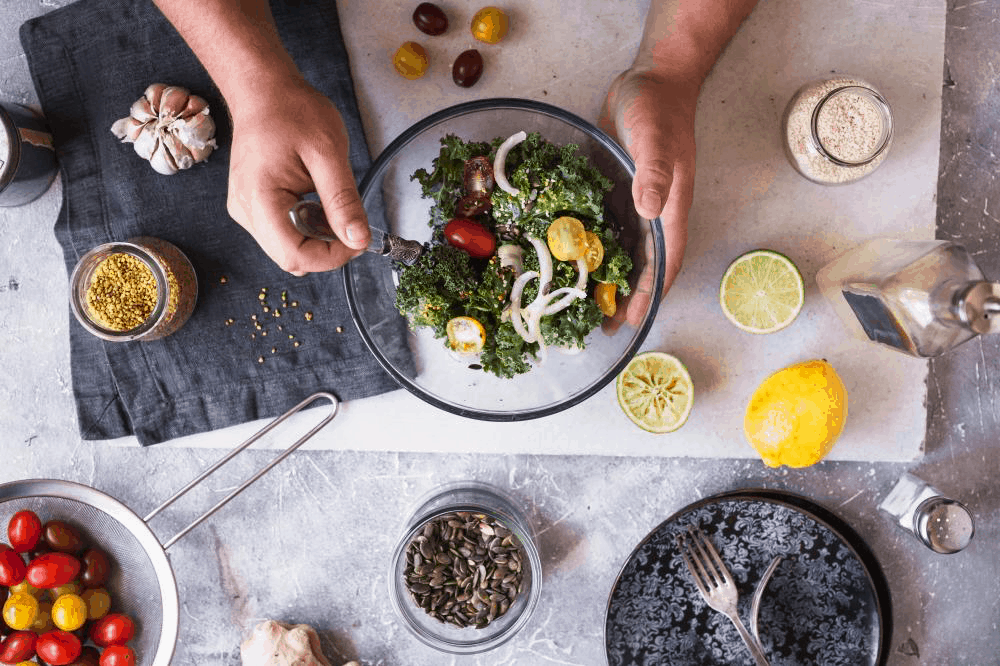 Person-preparing-healthy-salad