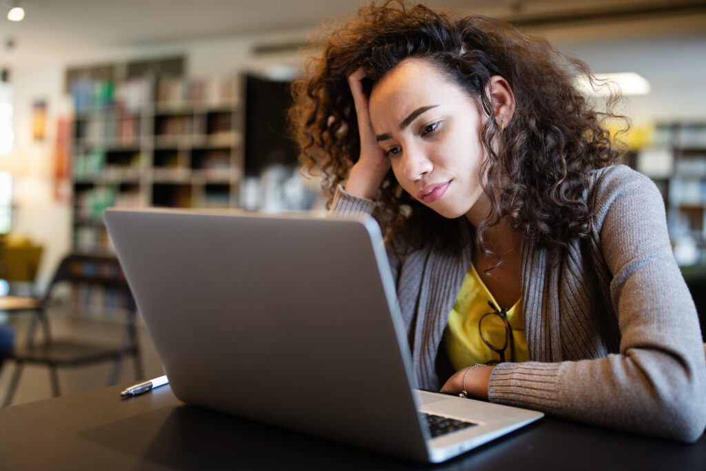 Young-girl-with-ADD-ADHD-at-computer-struggling-to-focus